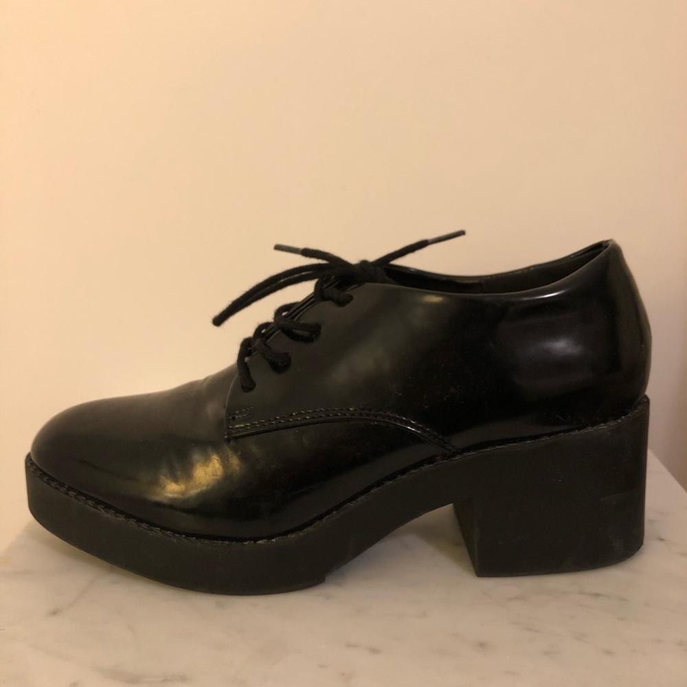Black lace-up loafers with heel